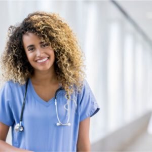 Latino Nurse with blue scrubs with blurred background. Remediation